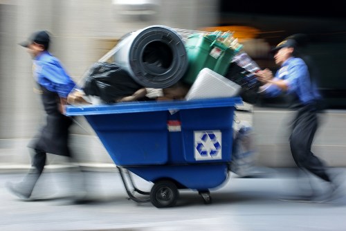 Scheduled waste collection trucks in Heston